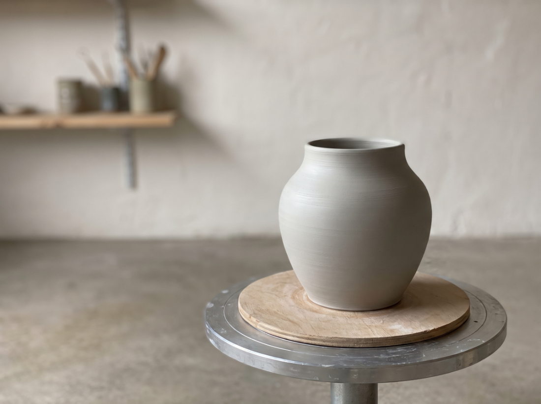 A pottery trimming process step in the Tiny Porcelain studio